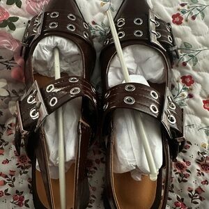 Brown Patent Leather Buckle Flats. Size 7 1/2.  New